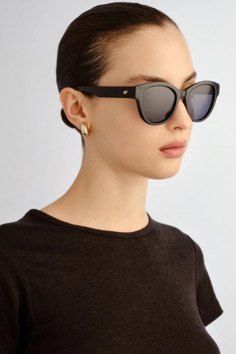 Naisten mustat aurinkolasit